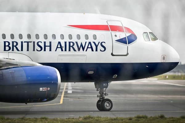 A British Airways flight returned to London Gatwick Airport after a reported fire involving a passenger’s power bank, with passengers describing a terrifying ordeal in the air. (Photo by GLYN KIRK/AFP via Getty Images)