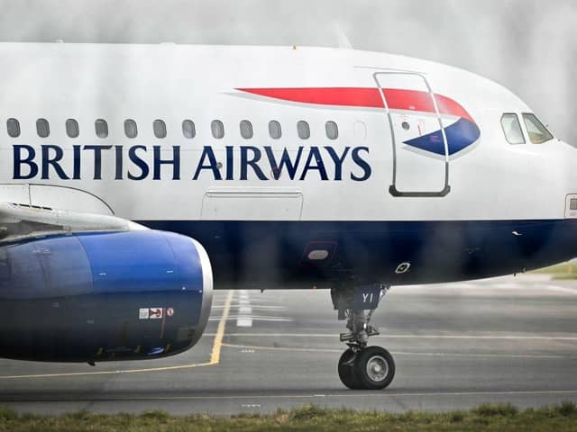 A British Airways flight returned to London Gatwick Airport after a reported fire involving a passenger’s power bank, with passengers describing a terrifying ordeal in the air. (Photo by GLYN KIRK/AFP via Getty Images)