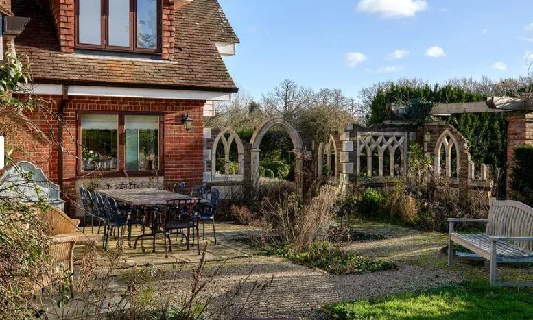 Past a sunken garden with water feature and rill, a stunning brick and stone archway leads to the outside pool. This charming area has a wonderful stone flagged terrace surrounding the pool with plenty of space for a BBQ or summer party.