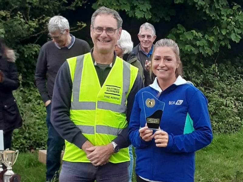 Lindsey Jones receives her Improvers Award for the Hastings 5 mile race