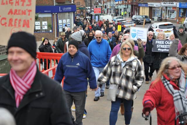 Residents walking up Station Road at the demonstration in the centre of Burgess Hill on Saturday, March 4. Photo: Steve Robards, SR2303061