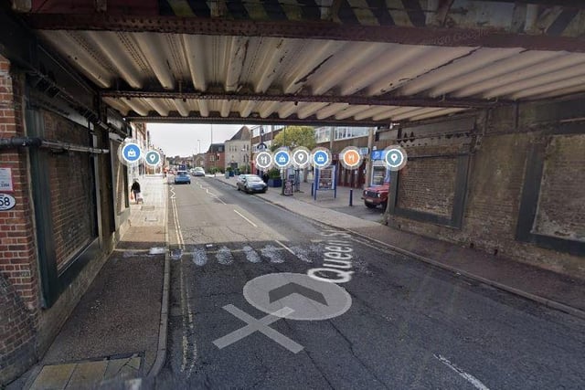 A deep pothole beneath a puddle under the rail bridge in Horsham's Queen Street is said to be a 'serious hazard to small-wheeled scooters'