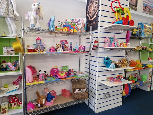 Inside Guild Care's new shop dedicated to children's toys, clothes and equipment, as influencer Jen Graham, known as Charity Shop Girl cuts the ribbon to officially open the Portland Road store