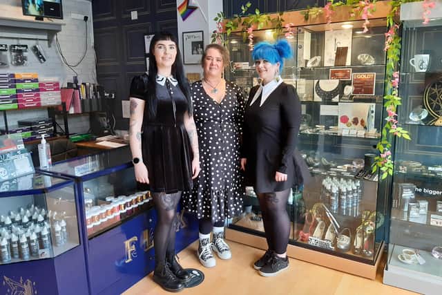 Flux Piercing Studio owner Marnie Williams, known as Princess Marnie, centre, with manager Serena Mitchell, right, and colleague Torreya Sweetman