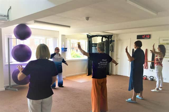 Carers enjoy a lesson in Chi Kung, led by Danny Girl from Aoi Bara.