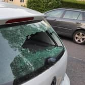 A car in Ashford Road, Hastings, has its rear windscreen smashed