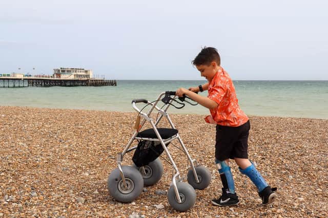 Harry Ragless testing out the all-terrain rollator on Worthing Beach. Photo: Worthing Borough Council