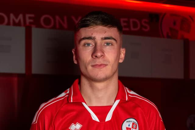 Crawley Town have signed highly-rated full-back, Jonny Russell, from Glentoran FC of The NIFL Premiership for an undisclosed fee.