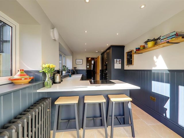 The luxury kitchen has built-in appliances