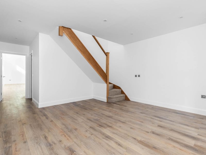There is a handmade oak staircase leading up to the first floor