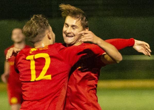 Action from Newhaven v Horsham YMCA at Fort Road in the SCFL premier