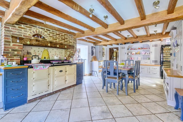 The large country kitchen comes complete with Aga