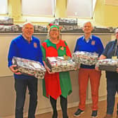 Alison Whitburn, Morrisons Littlehampton community champion, second left, with, from left, Rotarian Bruce Green, Littlehampton Rotary Club president Peter Ripley, Nicky Thompson from Littlehampton & District Foodbank, and Rotarian Keith Green