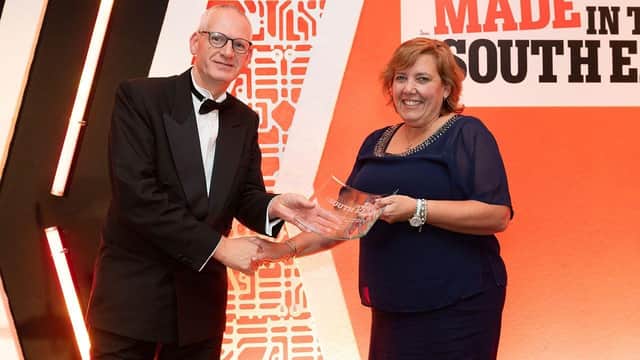 Photo: Lorraine Avery, Managing Director, Bluelite Group, being presented with the award by Robin Simpson, Manufacturing Growth Manager, Oxford Innovation.