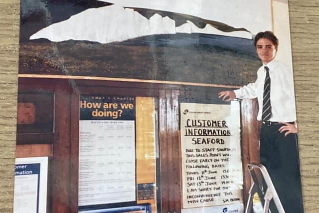 1997 photo of 17-year-old Henry Robertson-Nicol with his painting at Seaford railway station