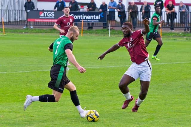 Match action from the FA Trophy first round proper tie between Burgess Hill Town and Hastings United. Picture by Chris Neal