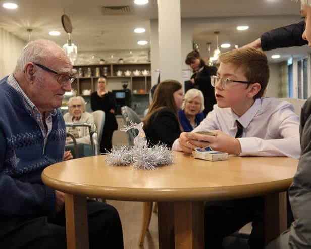 Beacon Academy students shared festive stories, poems, handmade cards with care home residents.