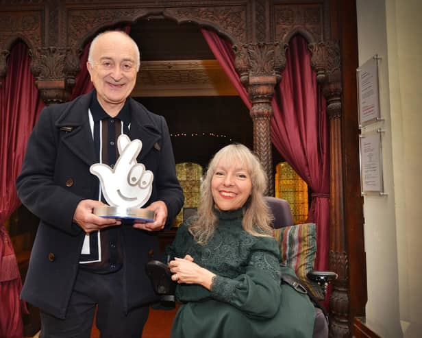 Sir Tony Robinson presenting National Lottery Awards Heritage Winner Esther Fox with her award at Hastings Museum on October 20 2023.