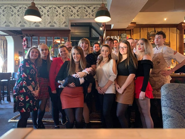 The team at The Thomas A Becket pub over the years