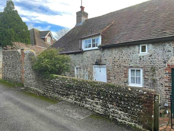 CHARACTER COTTAGE: Two/three-bedroom 4 The Street, Shoreham was among 142 lots in the latest auction held by Clive Emson Land and Property Auctioneers.