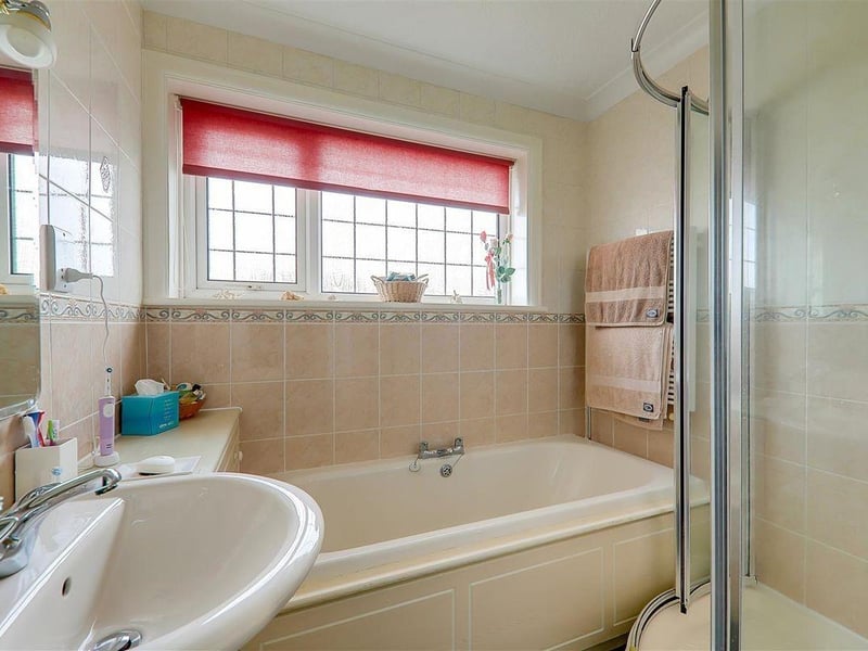 This three-bedroom detached house with feature garden has come on the market with Bacon and Company with a guide price of £725,000