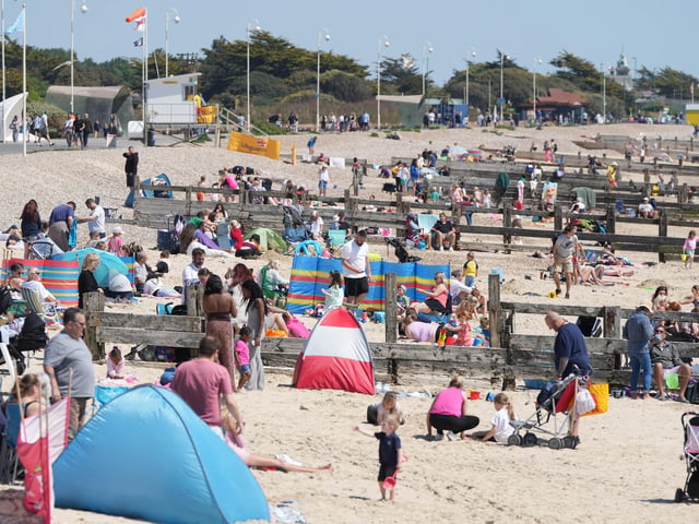 Beachgoers have flocked to a Sussex seaside town to soak up the sun