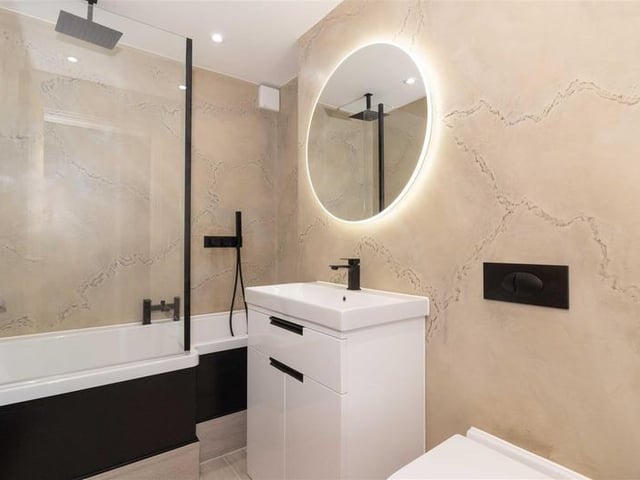 Offers in excess of £900,000 are invited for this new luxury property in Mill Lane, High Salvington. It has beautiful views over the South Downs, versatile and spacious accommodation.