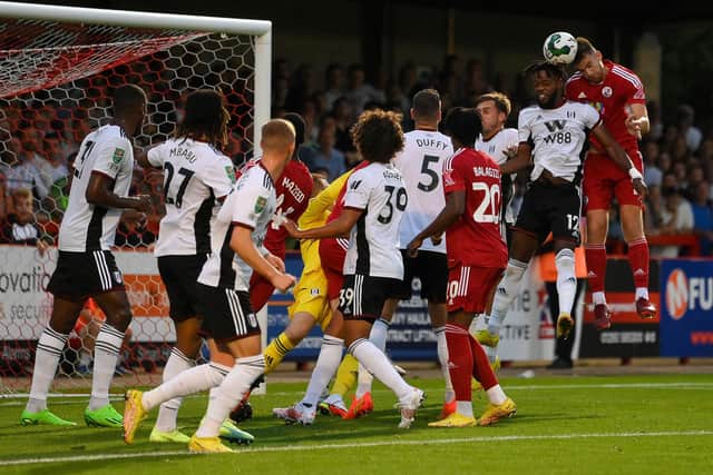 Harry Ransom heads over during the Carabao Cup Second Round match between Crawley Town and Fulham at Broadfield Stadium. (Photo by Mike Hewitt/Getty Images)