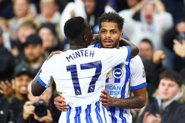 Georginio Rutter of Brighton & Hove Albion celebrates scoring his team's second goal against Tottenham with teammate Yankuba Minteh