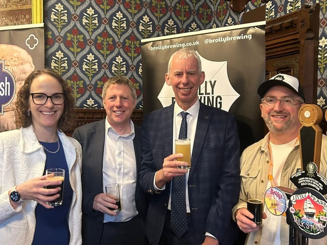Brook Saunders from Brolly Brewing with MPs John Milne, James MacCleary and Alison Bennett.