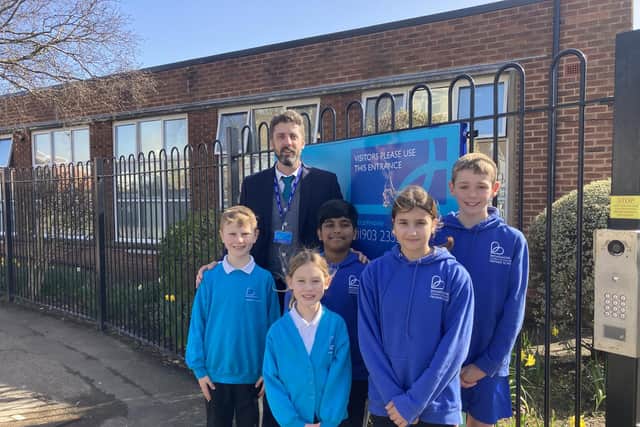 Head teacher Aaron Morrissey with pupils at Broadwater CE Primary School in Worthing, as the school gets ready to celebrate its 150th anniversary