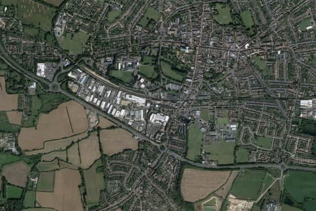 CC/22/01599/FUL: 41 Terminus Road. Demolition of existing property and outbuildings. New motor showroom with 1 no. motor vehicle workshop (Including MOT) and valet prep area - all with associated hard and soft landscaping. (Photo: Google Maps)
