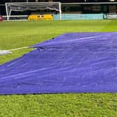 Covers on the problem part of the pitch at Nyewood Lane | Picture: BRTFC