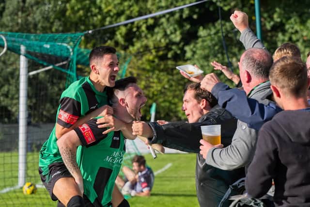 Dan Perry celebrates netting Burgess Hill Town's winner against East Grinstead Town. Picture by Chris Neal