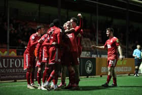 Crawley Town players celebrate in the win against Notts County at the Broadfield | Picture: Eva Gilbert