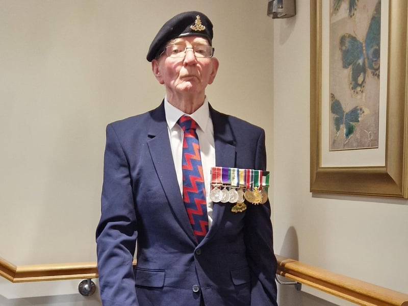 Debbie Bushby arranged for Jim Cox's medals to be polished and properly mounted