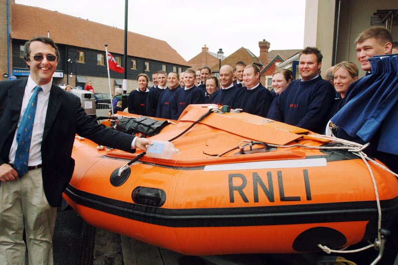 Nick Ellis with volunteers at Littlehampton Lifeboat Station, naming the D class lifeboat Spirit of Juniper in May 2005
