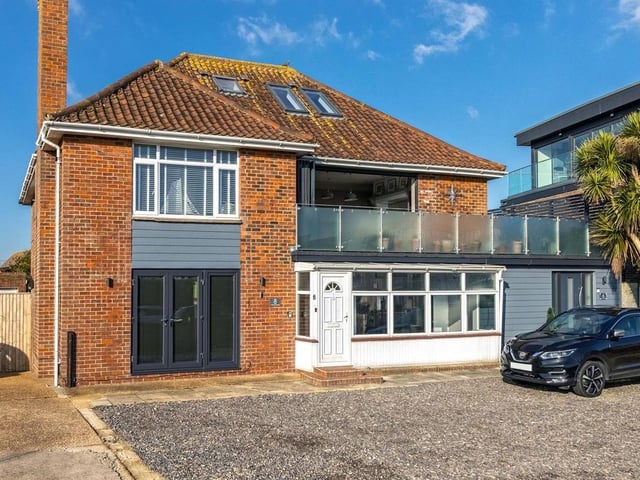 This £1,325,000 home boasts a seafront location, five bedrooms and four reception rooms.