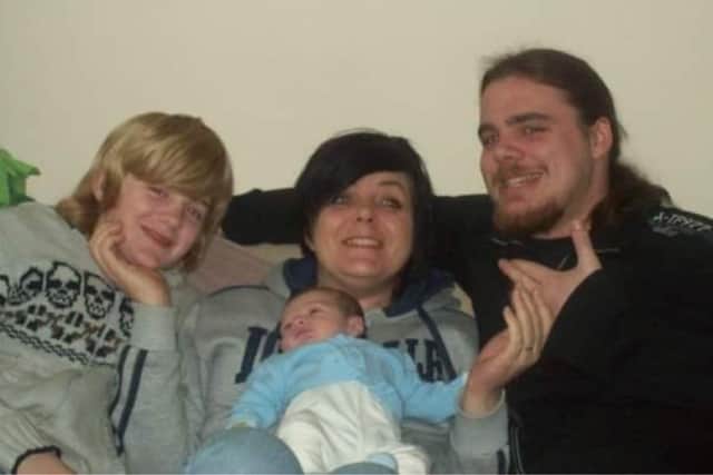 Hayden Curtis with his mum Emma Mccourty, brother Carl and nephew Jack