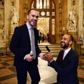 Josh Babarinde (right) with his partner Connor (left). Photo: Earl Russell