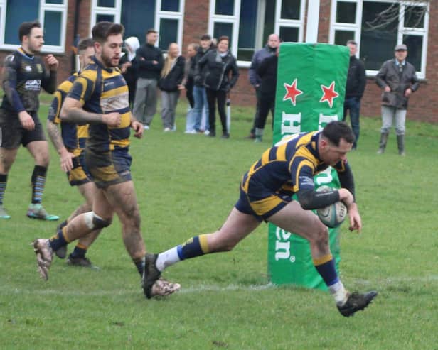 Aaron Hossack goes over for a try in Eastbourne's beating of Old Walcountians | Picture: John Feakins