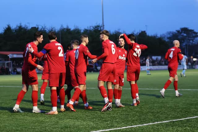 Worthing pictured celebrating in their recent win at Eastbourne - and it was another away victory, this time against Truro, that lifted them to second in the table | Picture: Mike Gunn