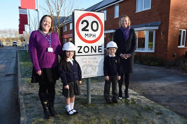 Arjun and Jelissa see their speed sign in action at Heathy Wood