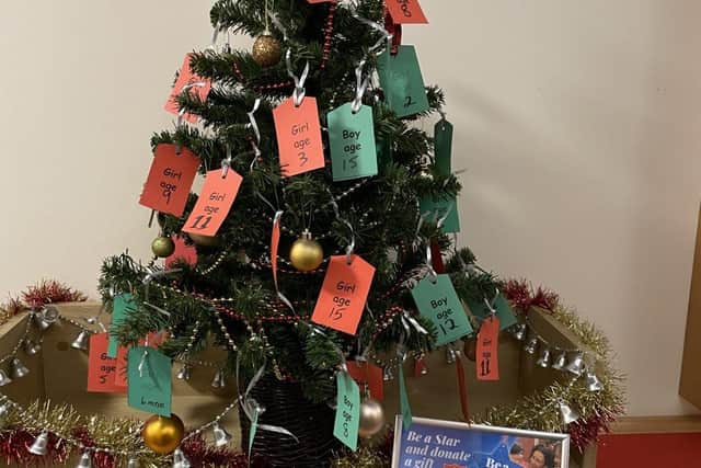 Christmas Tree with pledges for the gifts needed this year