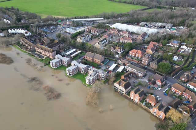 Aerial views captured the extent of flooding from the River Arun in Pulborough today (January 16). Photo: Eddie Mitchell