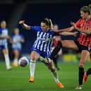 Elisabeth Terland of Brighton & Hove Albion runs with the ball under pressure from weve during the Barclays Women´s Super League match between Brighton & Hove Albion and Everton FC (Photo by Steve Bardens/Getty Images)
