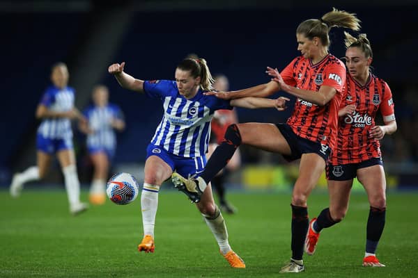 Elisabeth Terland of Brighton & Hove Albion runs with the ball under pressure from weve during the Barclays Women´s Super League match between Brighton & Hove Albion and Everton FC (Photo by Steve Bardens/Getty Images)