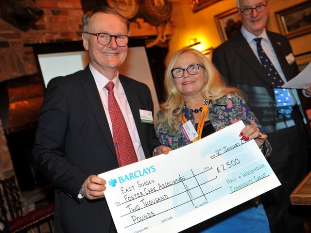 Judge Adrian Barrott presents a cheque for £2,500 to East Sussex Foster Care Association