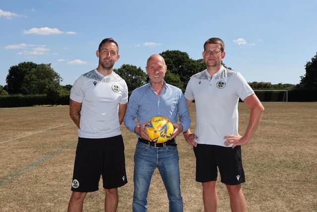 Perry McCarthy with manager Dan Logue (left) and Chairman Jack Ayles (right)