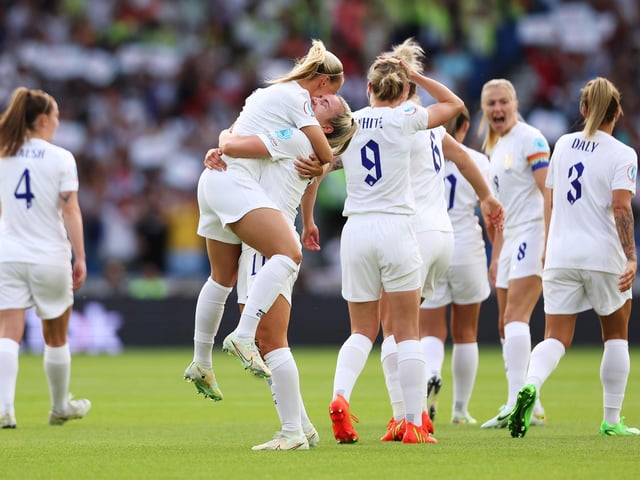 Lauren Hemp celebrates with Beth Mead.